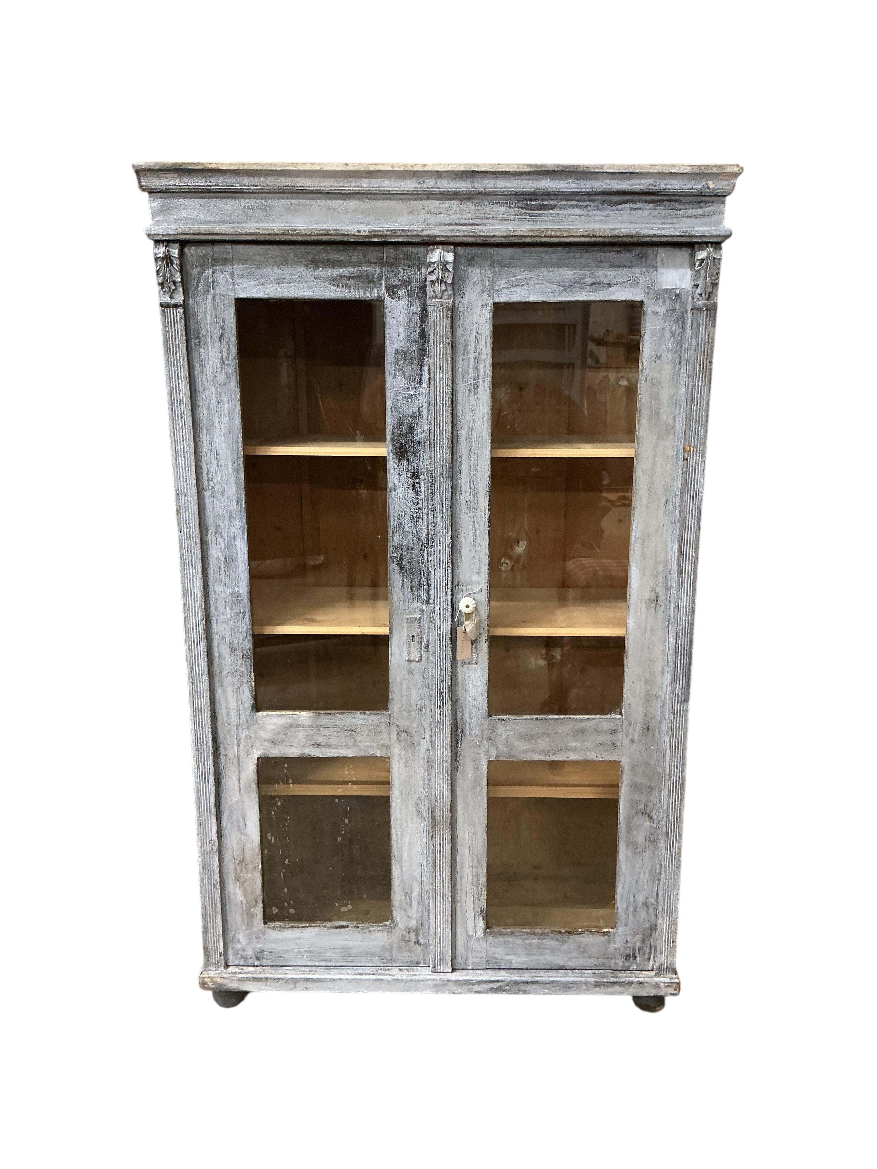 A 19th century East European painted pine cabinet, width 108cm, depth 46cm, height 178cm